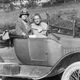 Alice B. Toklas and Gertrude Stein in open car